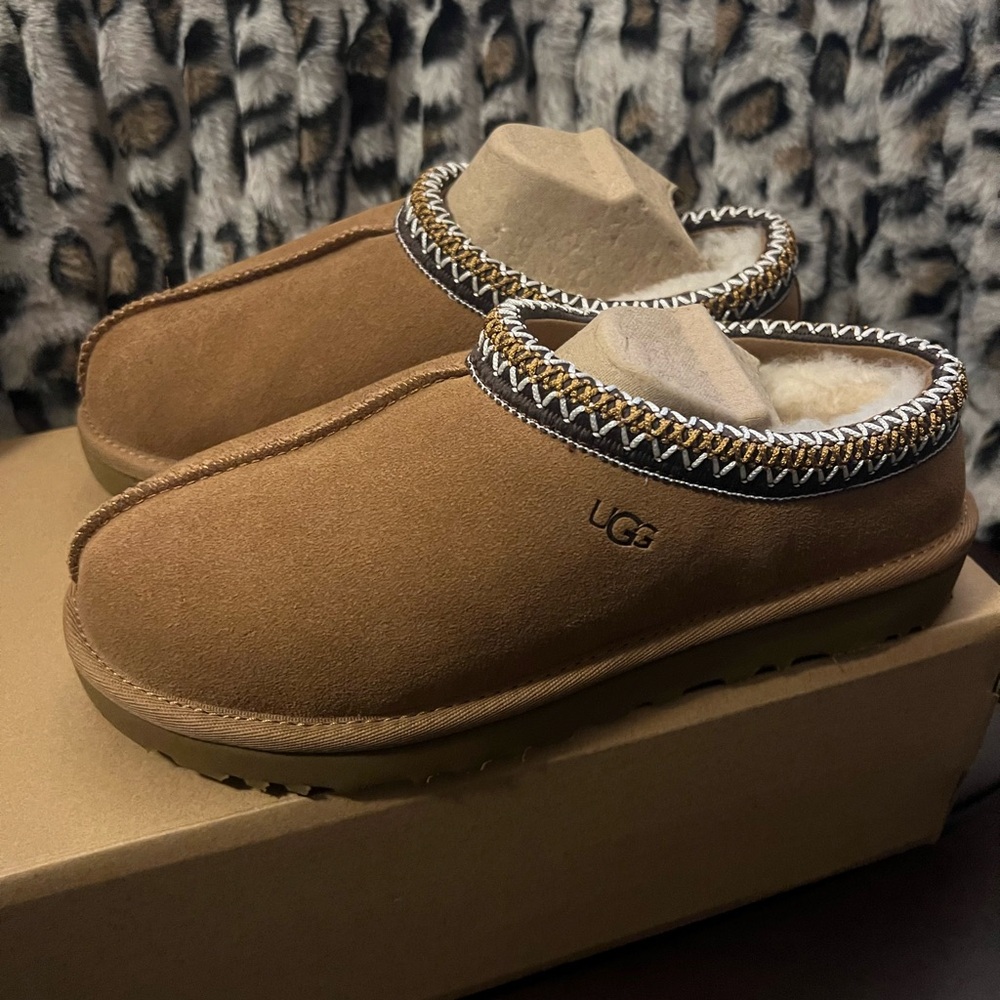 UGG Black and Gold Shearling Lined Shoes